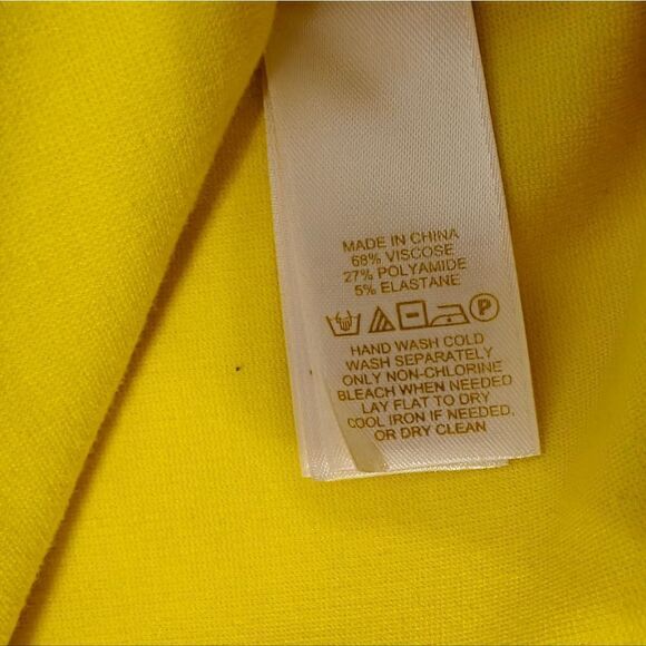ケイト・スペードの黄色のAラインのラグランの帽子の袖のポケットSz S 